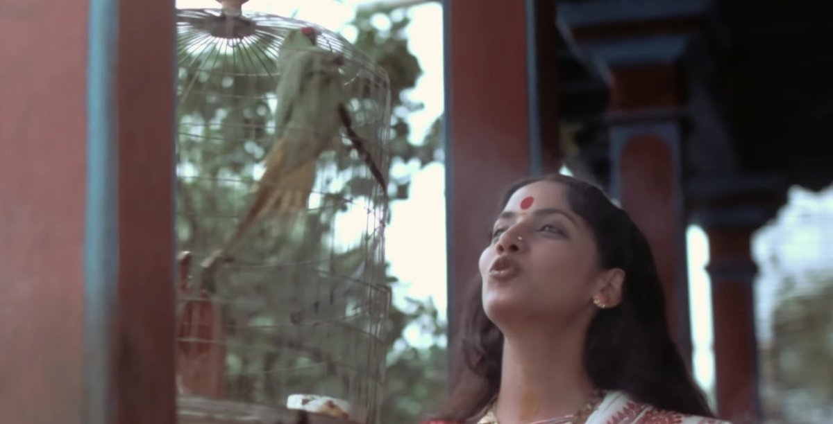 ItsVenkat_'s tweet photo. In Mandi, the caged parrot symbolizes Rukmini Bai’s beloved daughter, Zeenat. Their confrontation, set against the white curtain concealing hidden truths, and Zeenat’s eventual escape, poignantly depict the strained relationship between the adoptive mother and daughter. https://t.co/krBMZlLwHH
