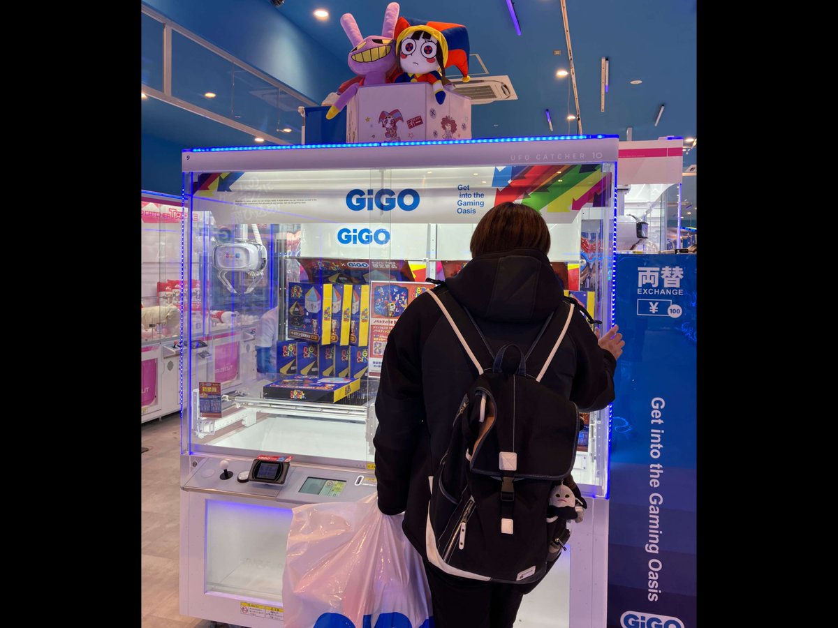 glitch_prod's tweet photo. Excited to show TADC now entering arcades across Tokyo, Japan! We hope everyone enjoys staring at our big frowning clown girl. https://t.co/WWKm0daK7l