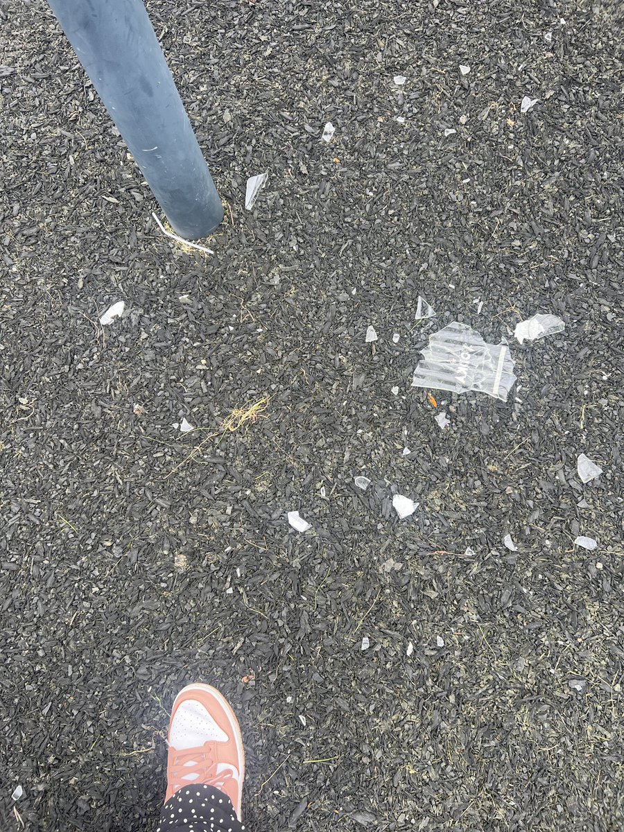 abbieeshep's tweet photo. @SomersetCouncil lovely… smashed glass vodka bottle all over the playground floor at ringolds park in street https://t.co/Q1RGRhj47h