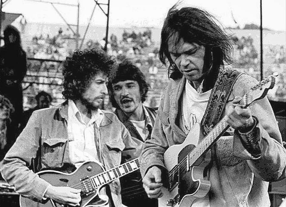 Neil Young, Bob Dylan and Rick Danko 
at the SNACK Benefit Concert in San Fransisco, 
1975