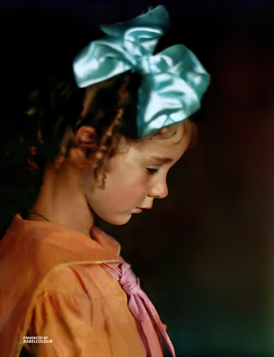 I've enhanced this autochrome of  rather soulful little girl with a beautiful turquoise bow, taken 115 years ago by an anonymous photographer. It is original colour from 1910, not colourised.
