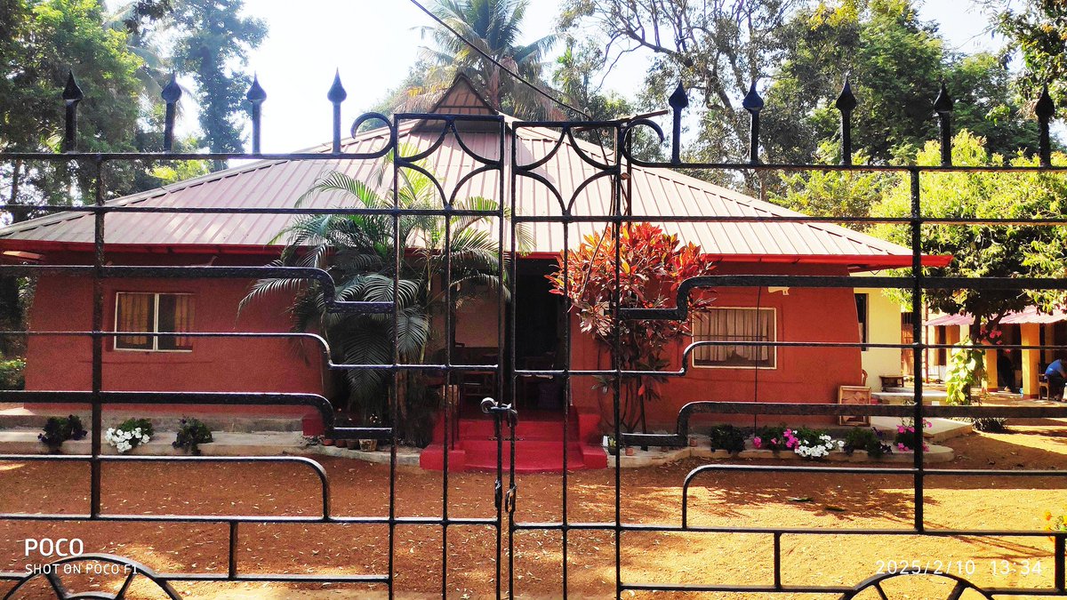 House of Santidev Ghosh.
Initially a mud house, later repaired. 
Simple and elegant. 
We miss this simplicity from our life these days.