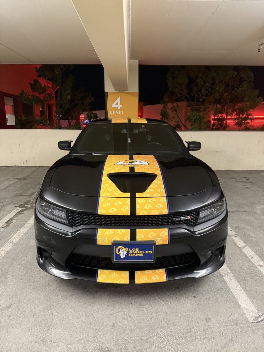 MLFootball's tweet photo. TRENDING: This Los Angeles fan had a custom-rapped #Rams car made.

👀

This is fire.

(📸: @BuiltForLA) https://t.co/VBdVpIHTlC
