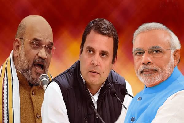 राहुल गांधी <a href="/RahulGandhi/">Rahul Gandhi</a> जब प्रधानमंत्री आवास पहुंचे तो अमित शाह और मोदी पहले से बैठे हुए थे। मोदी कुर्सी से खड़े होकर बोले "आइए राहुल जी", वही अमित शाह बैठे रहे। राहुल ने मोदी का अभिवादन किया और बैठ गए। फिर शाह की ओर आंख तरेर कर  देखा तो शाह ने आंख नीचे कर ली।

चश्मे को नाक पर