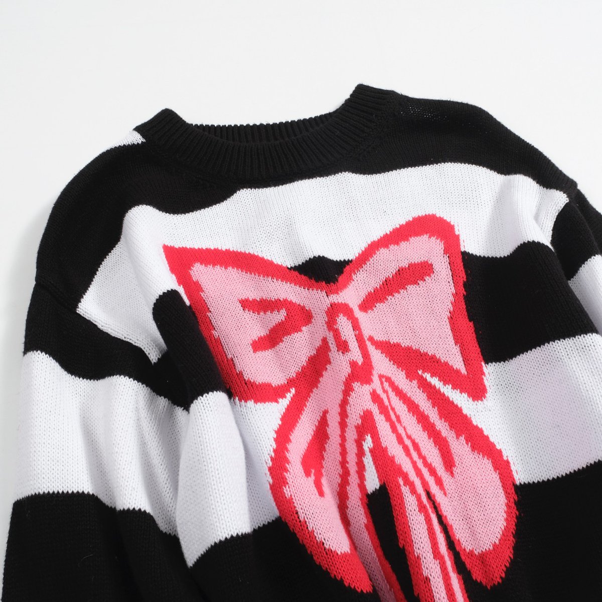 OXKnitstore's tweet image. Get playful with our sweater! 🎀✨ Featuring bold black and white stripes with a cute pink bow, it's a fun addition to your wardrobe. 
🔗 SKU: OXA796
#PolkaDotStyle #BoldAndBright #VintageVibes #OXKNIT #RetroFashion