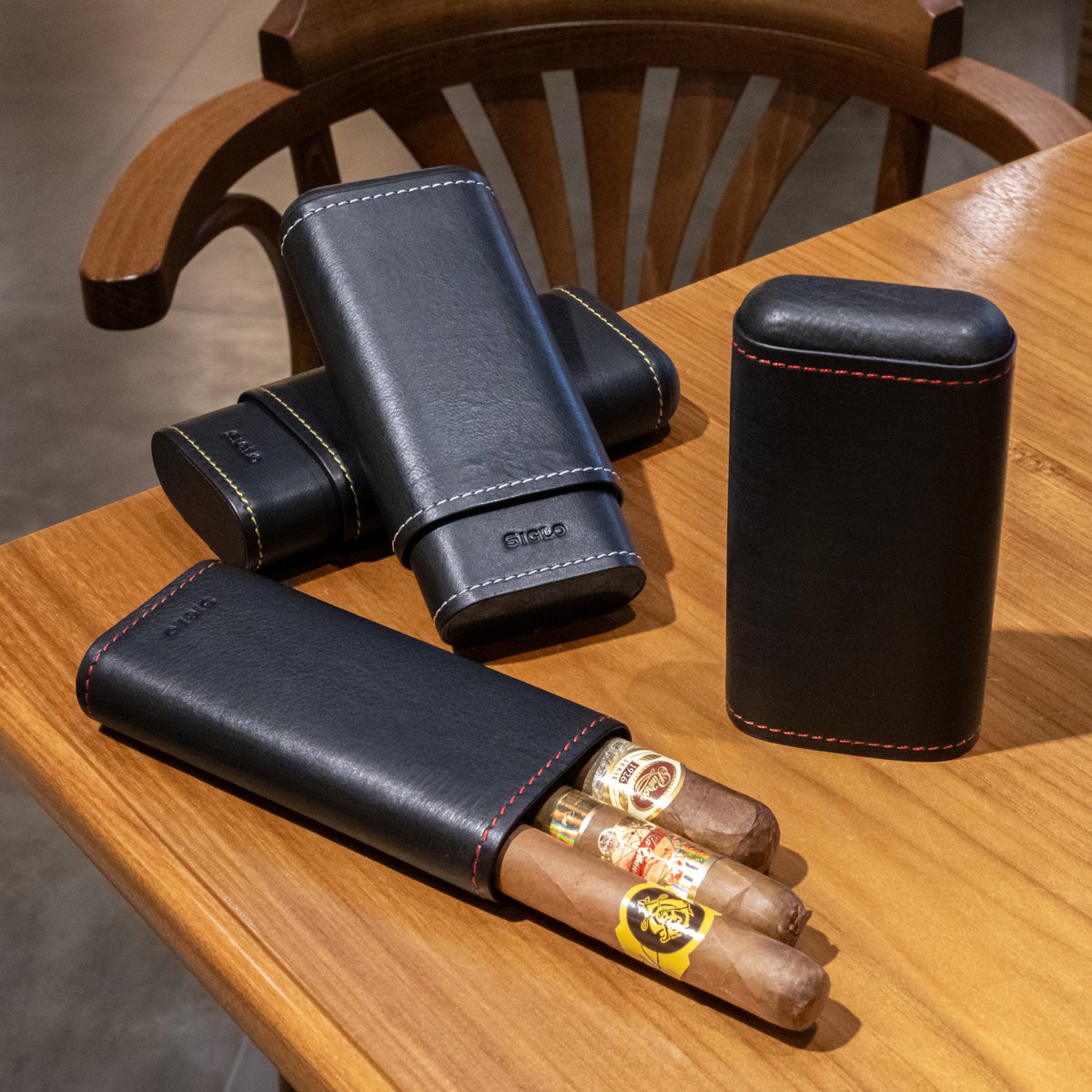 aficionadohub's tweet photo. In search for a cigar case? We’ve got one for you! 👇

Made in smooth black leather, this sigloaccessory case will gently hold up to 3 #cigars while you’re on a trip.😉

#cigarcase #siglocigarcase #cigaraccessory  less https://t.co/dCC8kcIUvm
