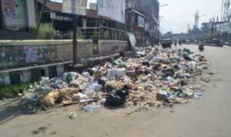 AYSingh9's tweet photo. manipur streets &amp; markets are drowning in garbage! 😷 Trash piles up, drains clog, and even the Stop littering, use dustbins, and keep the city clean. A smart city needs smart citizens! #Cleanmanipur#ActNow https://t.co/pJhE5U0ogg