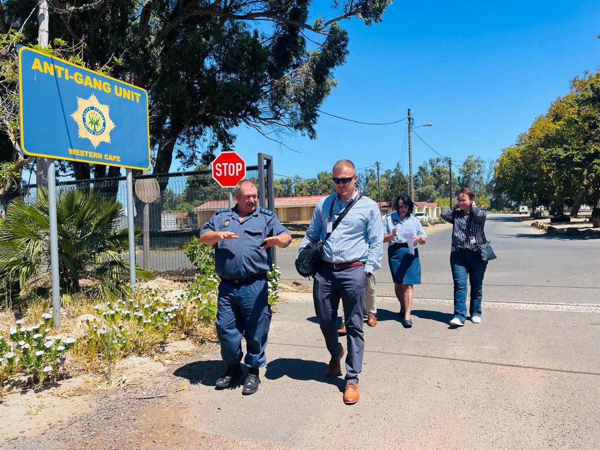 IanCameron23's tweet photo. ๐ SAPS Anti-Gang Unit Unannounced Oversight Visit โ 18 FEBRUARY 2025
Today, we conducted an unannounced oversight visit to the SAPS Anti-Gang Unit (AGU) in the Western Cape, based at Old Faure. This unit is meant to lead the fight against gangsterism, yet it is being crippled by a lack of resources, infrastructure failures, and severe personnel shortages.
๐ง Infrastructure & Facilities โ Years of Neglect
The base has been occupied by SAPS since 1993 but has seen little to no maintenance from the Department of Public Works and Infrastructure (DPWI). To make matters worse, SAPS owes DPWI nearly R2 billion at the moment.
Office space is inadequate โ detectives do not have proper offices and must use police stations for interviews. There is no dedicated interview facility, forcing them to work in makeshift conditions.
Basic infrastructure is in complete disrepair:
210 members share just two female toilets and one male toilet.
No cleaners โ toilets are mostly broken, and blocked drains make conditions unbearable.
Frequent water outages, sometimes lasting up to a week, with no JoJo backup system for emergency water supply.
Cable theft regularly disrupts power supply.
Most fencing has been stolen, leaving the base completely exposed.
DPWI promised a perimeter wall four years ago, but nothing has been built due to "budget constraints."
Internet and communication systems are unreliable โ extremely slow speeds mean that when one system fails (phones, internet, or computers), all operations stop.
๐ฎ Personnel & Operational Challenges โ A Unit Set Up to Fail:
AGU has NO Fixed Establishment โ meaning the unit has no guaranteed staff complement for long-term sustainability.
AGU initially had nearly 50 detectives โ today, that number has dropped to just 34 to cover the entire Western Cape, despite gang violence increasing.
The unit operates at the capacity of a Captain-level station even though it should have the resources and structure of a Brigadier-level station.
There is only ONE Finance Clerk for the entire unit, leading to delays in overtime payments, operational expenses, and financial processing. There is no financial oversight, and the burden on this one member is completely unfair.
Support services are critically under-resourced:
Only two HR members responsible for 210 personnel.
One fleet manager overseeing 79 vehicles โ an impossible workload.
AGU is being misused as a glorified crime prevention unit, rather than conducting targeted, intelligence-driven investigations.
Court duties and prisoner escorts are wasting the unitโs time โ TRT should be handling these tasks.
Each detective should have a uniformed technical team, but none exist. This was not the case in the past, but SAPS management changed the structure, leaving detectives without necessary backup.
In 2020, AGU detectives were moved to Organised Crime Investigation (OCI) under a different Section Head, causing confusion in command and control.
๐ Vehicle Shortages & Failing Fleet โ No Mobility, No Crime Prevention:
AGU operates 79 vehicles, yet:
90% of the fleet has over 250,000 km, making them unreliable for high-speed response.
No new vehicles have been allocated since 2018, severely affecting AGUโs operational capacity.
At least 50% of the fleet is usually in the garage, leaving members without adequate transport.
AGU keeps receiving old, second-hand vehicles from other stations, some with over 400,000 km on the clock.
The unit had to purchase three vehicles themselves, yet even these are not always available when gang wars erupt.
๐จ A Serious Concern: A Gangster Posing in an AGU Vehicle:
In 2022, I exposed a shocking case of a known gangster posing in an official AGU vehicle, flashing gang signs. The police officer who allowed this to happen is STILL working in the unit today. Even worse, he is now working in the operations room, the heart of the unit, where sensitive intelligence and operational planning takes place.
How is SAPS management allowing such an individual to be in a critical unit like AGU? Gang and police collusion continues to undermine crime-fighting efforts, and SAPS leadership must explain why nothing has been done about this incident.
๐ Full Story Here: https://t.co/xQ2mvx9IYs
๐จ What Happens Now โ Our Action Steps to Follow Up:
DPWI must urgently intervene to repair and maintain AGUโs infrastructure, including sanitation, security, and office facilities.
A secure storage facility must be built.
A dedicated holding facility must be built for ID parades and interviews, reducing unnecessary back-and-forth between AGU and stations.
AGU must be assigned a Fixed Establishment to ensure proper staffing, budgeting, and long-term planning.
New vehicles must be allocated immediately โ the unit cannot continue operating with an aging fleet.
Court duties and prisoner escorts should be removed from AGUโs responsibilities and transferred to TRT, as originally intended.
Detectives must have dedicated uniformed support teams, restoring the previous structure that allowed for effective crime-fighting and support for operations and investigations.
Additional HR, finance, and fleet management personnel must be urgently deployed to fill critical gaps in AGUโs support structure.
Immediate disciplinary action must be taken against police members who enable gang activity โ including removing compromised officers from AGUโs operations room.
Final Thoughts โ Fix AGU Now:
The Anti-Gang Unit is fighting a war against gangsterism, but they are being sent into battle with no 'weapons', no vehicles, and no proper infrastructure. Years of government neglect, mismanagement, and underfunding have left this unit in crisis.
We will now start the process of demanding urgent intervention and proper resourcing for AGU so that the fight against gangsterism can be effective and sustainable.