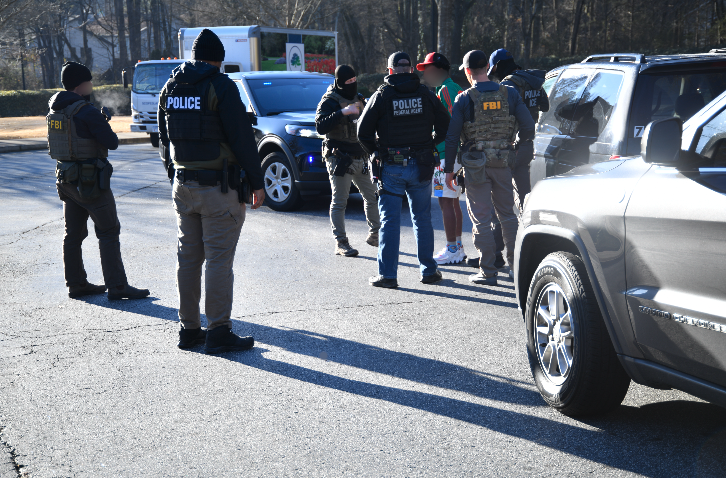 FBIAtlanta's tweet photo. #FBIAtlanta continues to provide support to our @ICEgov partners in immigration enforcement. During this op, an alleged TdA gang member was arrested. The joint effort shows our commitment of arresting dangerous criminals as part of our mission to keep Georgia safe. https://t.co/tyFyDOjQ6e
