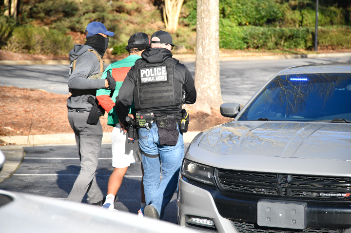 FBIAtlanta's tweet photo. #FBIAtlanta continues to provide support to our @ICEgov partners in immigration enforcement. During this op, an alleged TdA gang member was arrested. The joint effort shows our commitment of arresting dangerous criminals as part of our mission to keep Georgia safe. https://t.co/tyFyDOjQ6e