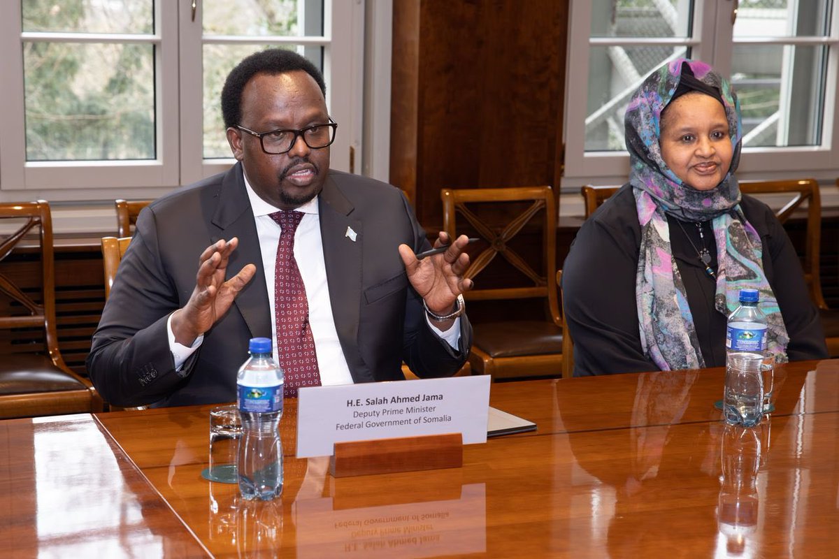 SomaliPM's tweet photo. Today in Geneva, Deputy Prime Minister @SalahJama met with WTO Director-General Dr. Ngozi Okonjo-Iweala, to advance Somalia’s @wto accession process. This significant step underscores Somalia’s commitment to integrating into the global trading system. Dr. Okonjo-Iweala pledged technical support to facilitate Somalia’s membership journey.