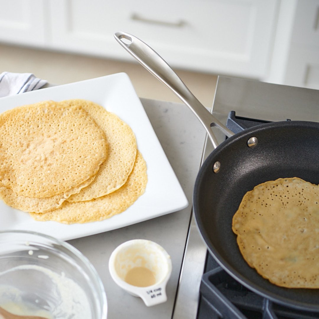akcookware's tweet photo. Who knew chickpeas could be this chic? 😏 Whip up these irresistible crepes with lemon filling and a warm blueberry-basil compote—all thanks to our nonstick skillet (because struggling with stuck crepes is so last year).  #AmericanKitchen

🔍️ Learn more: https://t.co/PzgUKlRZw8 https://t.co/XF6DjHZo6p