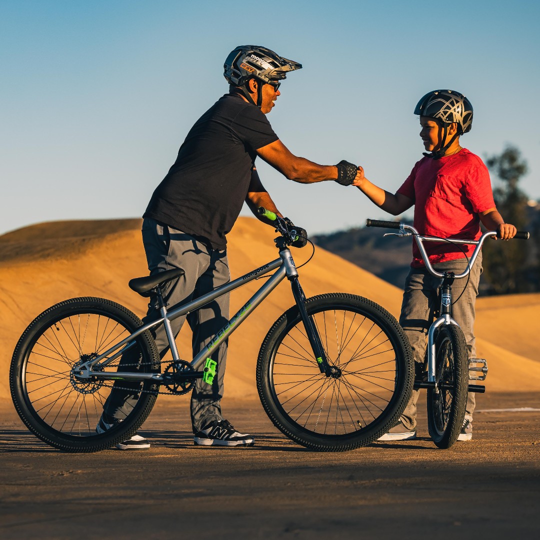 Mongoose's tweet image. How cool is it for a father-son photoshoot! Dwayne and Milo-Jones testing out some bikes at a local pump track!
 #FatherSon #BikeLife #PumpTrack #FamilyFun #BikeLove