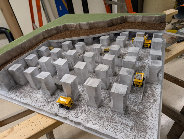 UK_Mining's tweet photo. UK Mining Engineering students Michael Long, Nathan Reynolds, Jess Burr, Cade Spurlock, Jack Guyler, Isaac Madil and Aiden Adkins under the supervision of Dr. Schafrik created an educational model of a stone mine for Ohio Aggregates &amp; Industrial Minerals Association (OAIMA). https://t.co/maijfH7NUy