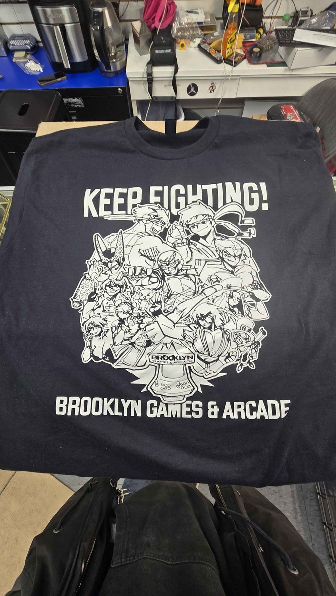 HEY!! if you wanna wear something made by yours truly, and help support keeping local arcade open while you're at it, pre-order one of these cool ass shirts i made!!

they are $30 bucks (USD) each, and ALL profits are going to the <a href="/ArcadeBrooklyn/">Brooklyn Games & Arcade</a> fundraiser (linked in thread)