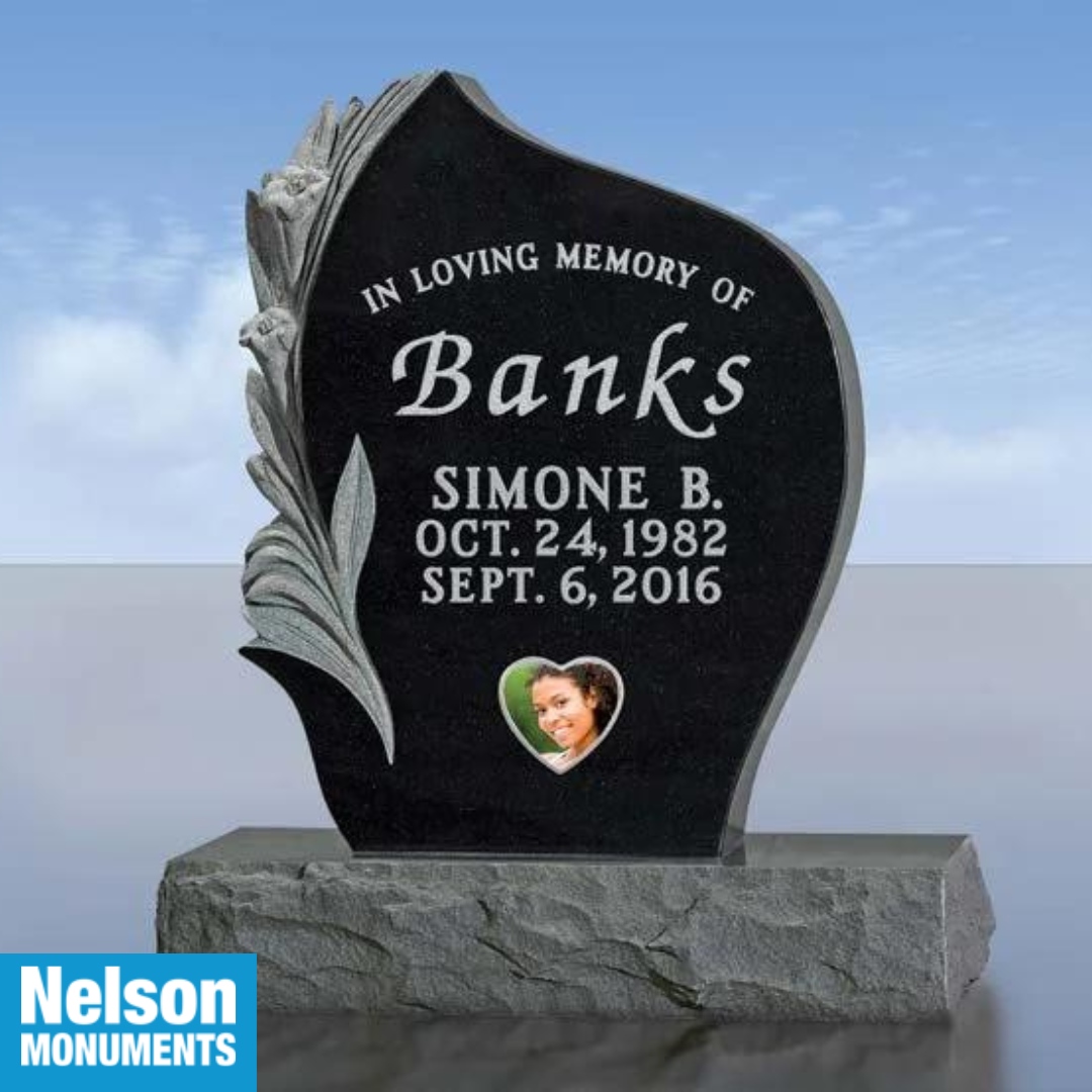 NelsonMonuments's tweet photo. Handcrafted lilies adorn this exceptional uniquely shaped carved monument in black granite with optional matching rock edge base. The optional heart-shaped porcelain portrait provides colour to this extraordinary memorial shown with cut-in family name and inscription. 

View m... https://t.co/5hDOodUyFo