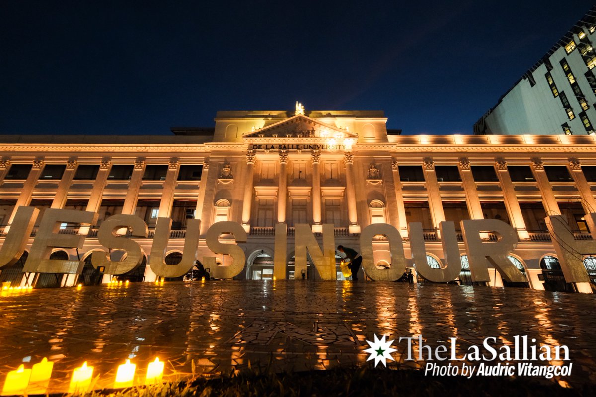 JUST IN: The facade of St. La Salle Hall shines with a vibrant yellow in memory of the EDSA People Power Revolution, also known as the "Yellow Revolution," which peacefully toppled the dictatorial rule of President Ferdinand Marcos on February 25, 1986. #EDSA39