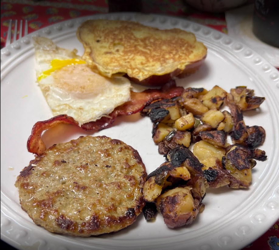 Half of our Garfield Sampler! If you want a little bit of everything it comes an egg, pancake, French toast, hashbrowns, bacon and sausage.

We can also make it vegan!