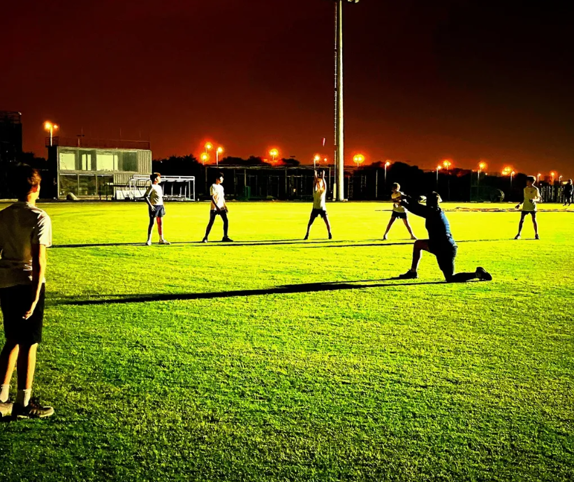 A morning of swimming and water polo at RGS Guildford Dubai was followed by a trip to Ajman Cricket Academy. Despite rain canceling the match, we trained under desert lights, immersed in the sounds of prayer—a phenomenal cricketing and cultural experience.