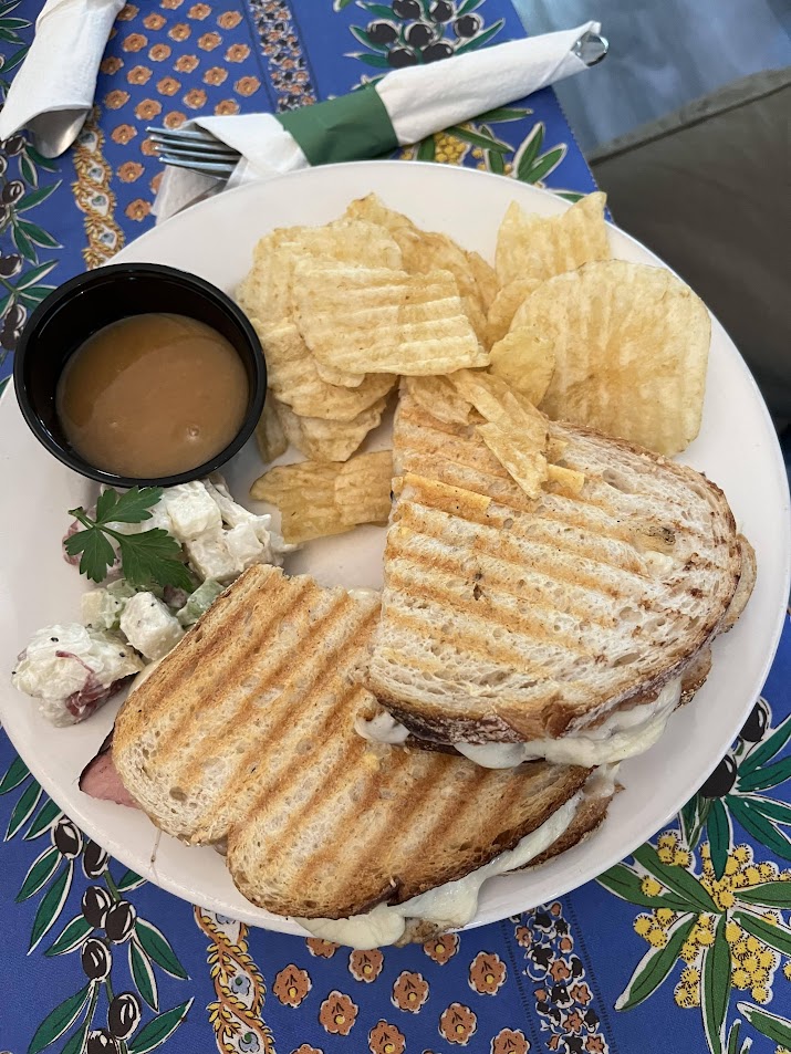 Digging into this roast beef panini with some au jus!

You can't beat the Black Cat Café for your lunch needs - you might even get a free sample of our famous potatoes salad.