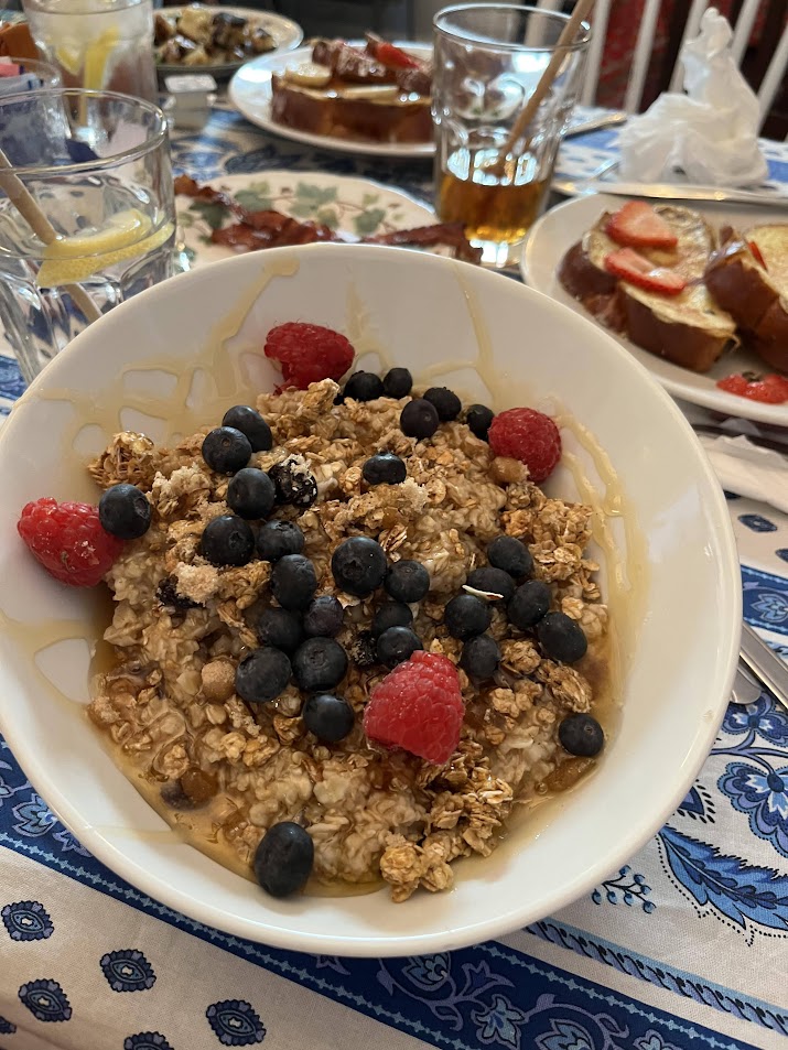 At the Black Cat Café, 80% of every check goes to saving abused, injured, homeless, abandoned and sick cats and kittens! Come say "hello!" to our all volunteer staff and order something delicious like a warm bowl of oatmeal with fresh berries and a drizzle of honey!
