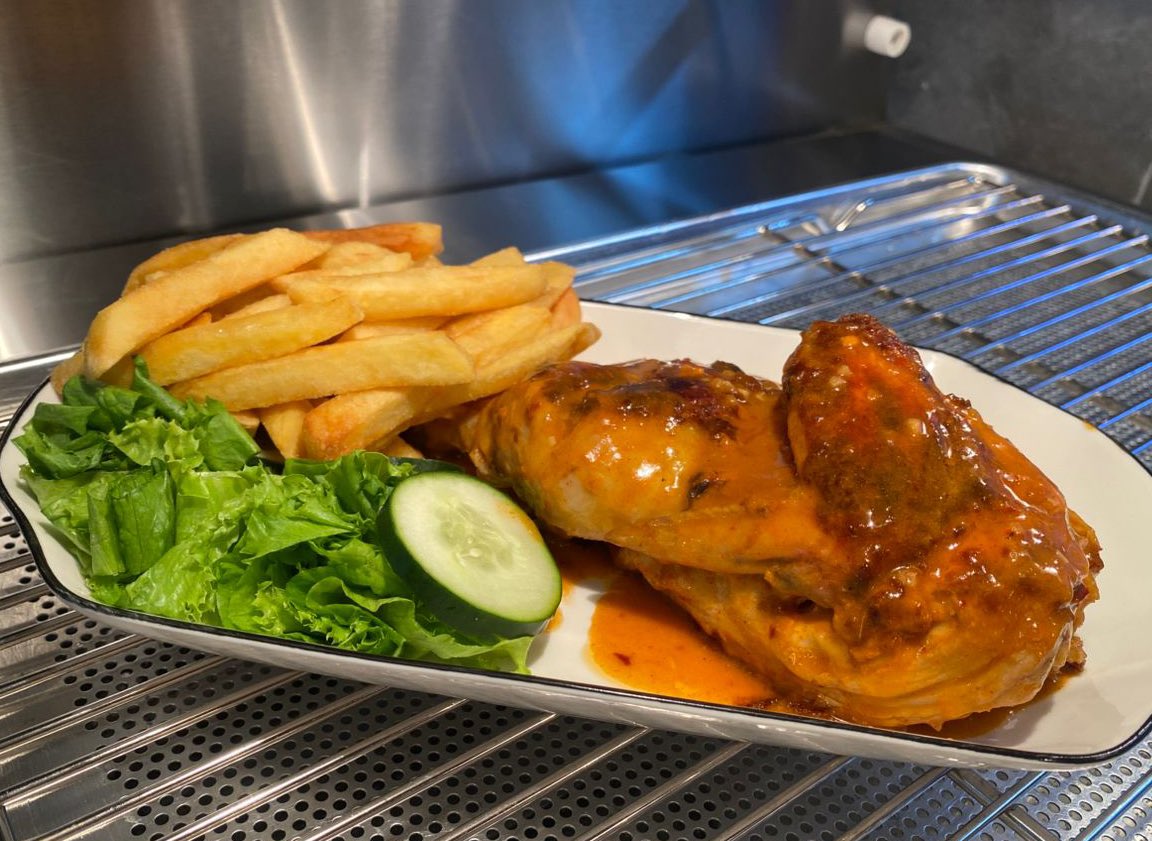Have you tried our half chicken meal yet? Why not if you haven’t, we serve it hot from the oven with crispy chips and fresh salads #HalfChicken #CpGambia 🧡