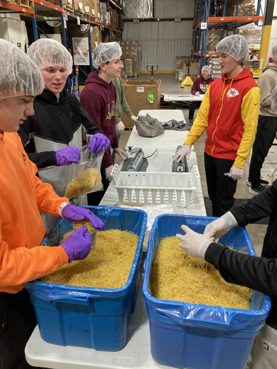 The DHS Baseball Program was proud to help the Midwest Food Bank last night.  The players and coaches put together over 1,000 bags of pasta to be donated to local organizations!