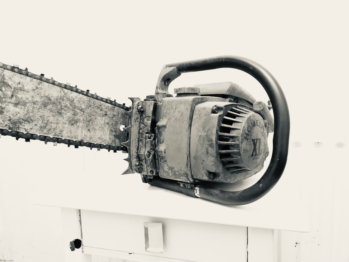 ArtJerrico's tweet photo. @RealLilSull hello, I have completed my XL12 chainsaw &amp; got some closeup beauty monochrome stylised photos of it, ep 3 of my blog is being made right now #evildead #evildeadprops #evildeadchainsaw #homeliteXL12 #horrorprops https://t.co/2QKVu6BWh4