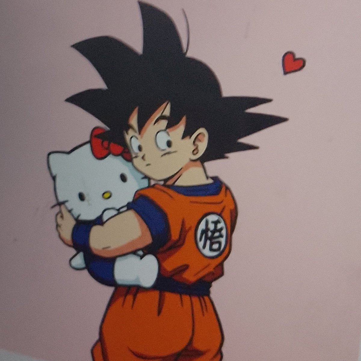 sou desocupada.gente pedi pro Google fz o Goku cuidando da hello Kitty