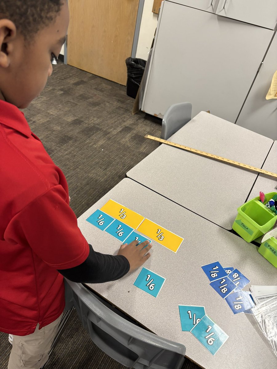 Scholars using manipulatives to explain fraction equivalency. Hands on exercises before we dive into our Eureka Unit. #MathOnTheHill