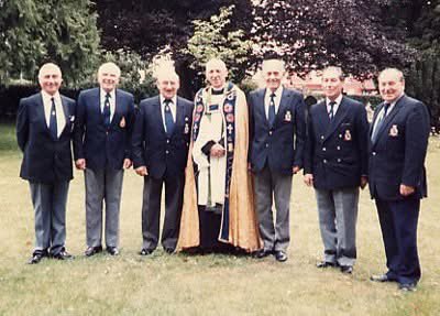Some of the men who formed HMSHA in 1975. Chaplain, Rev Ron Paterson, with fellow Hood veterans on his last Sunday as vicar of Swanmore in June 1985. Left to right: R Irwin, Tom Hooper, Charlie Strudwick, Rev Paterson, Harry Purdue, John 'JR' WIlliams and Ken 'Nobby' Clark.