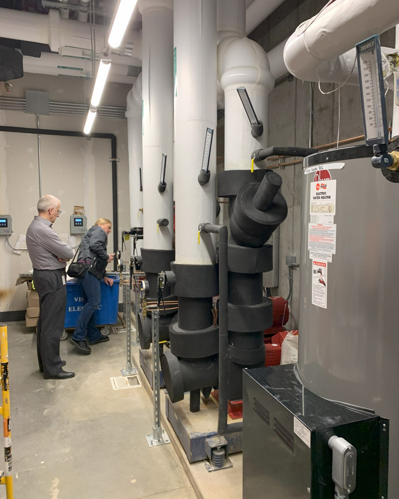 KAIenterprises's tweet image. Happy #NationalEngineersWeek! Mechanical Engineering Group Leader Peter McDonnell, PE, LEED AP BD+C and Senior Mechanical Designer Olga Kozlova recently went on a punch list visit to the new Nursing and Health Sciences Center on the @stlcc Florissant Valley Campus. #STLCC