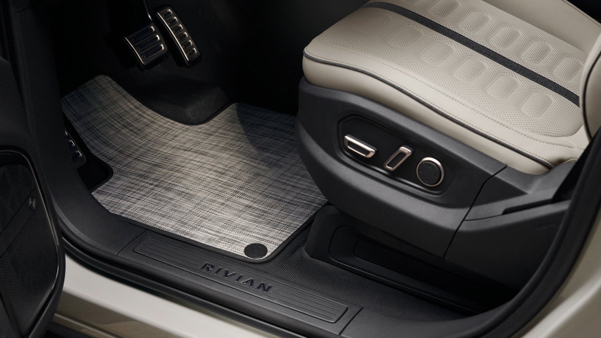 Rivian's tweet photo. Sandstone + Dark Ashwood: a rugged, high-contrast interior that embraces the stark beauty of the Golden State's iconic deserts. Available only in our Limited Edition California Dune. https://t.co/wMyDgZR1Ws