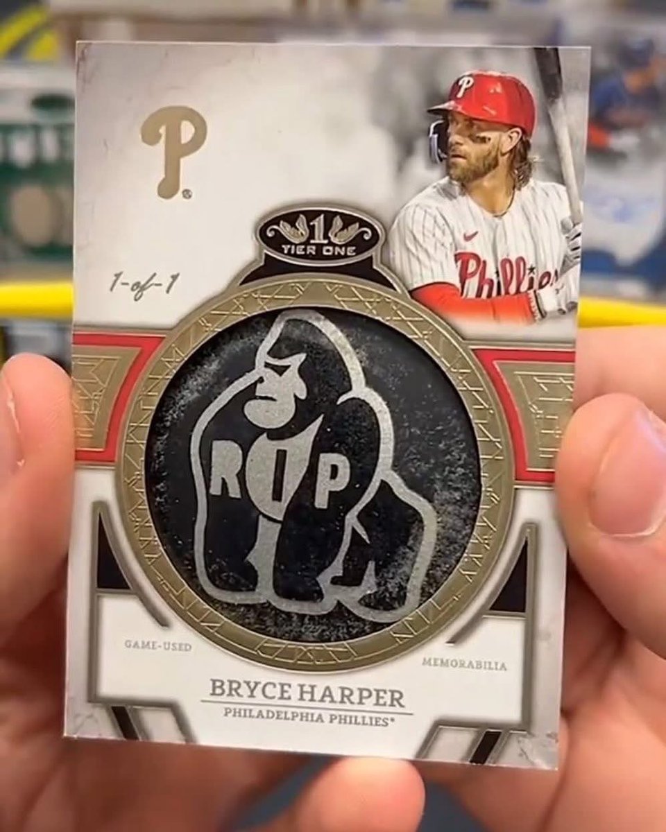 Topps's tweet photo. Bryce Harper's 1/1 game-used "RIP Harambe" bat knob card... 🦍🔥 https://t.co/CmsI7YgiIr