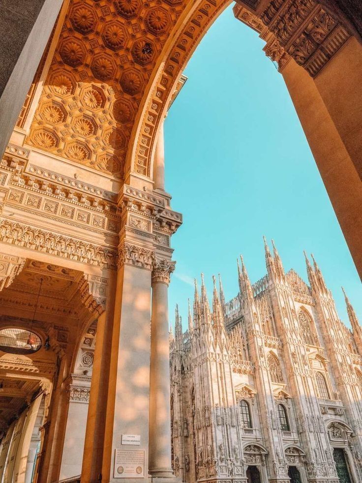 theshimmystore's tweet image. Golden light, Gothic splendor—Milan&apos;s Duomo framed by the elegance of the Galleria Vittorio Emanuele II. A masterpiece of history and design, where every detail tells a story. Have you wandered through this architectural wonder? ✨ #MilanDuomo #ItalianArchitecture #GoldenHour
