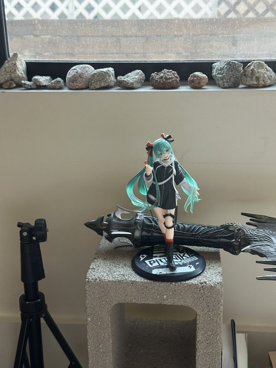 miku on my cement block next to my rock windowsill and sword #interiordesigner