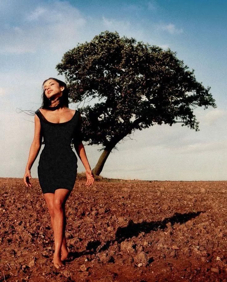 "In the quiet of the field, she listens to the whispers of the wind and the stories of the earth."