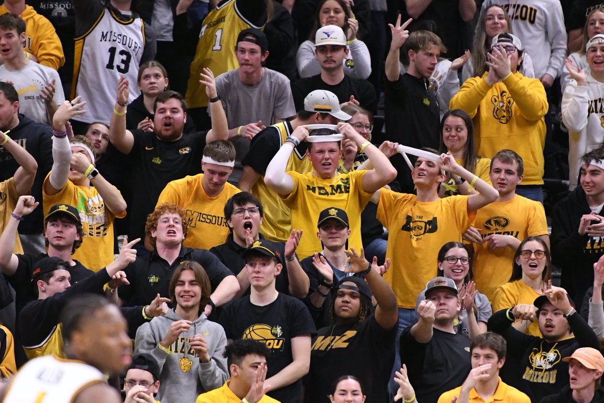 The "Crews Crew," a group of Mizzou students who imitate Jacob Crews, celebrate a three by Crews in the second half 📷