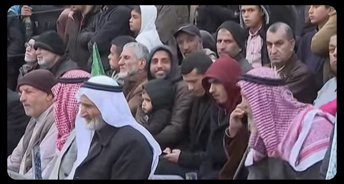 mrconfino's tweet image. Mock coffins, music and cheering as men, women and children turn up to what has to be the most morbid terror propaganda show in modern history - to watch the release of two dead Jewish kids, their mother and a dead 84-year-old Jewish man.