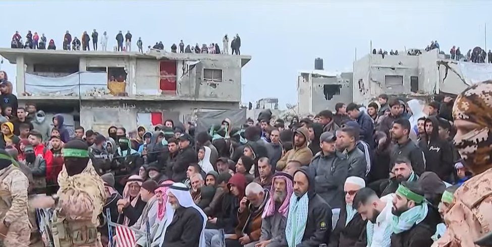 mrconfino's tweet image. Mock coffins, music and cheering as men, women and children turn up to what has to be the most morbid terror propaganda show in modern history - to watch the release of two dead Jewish kids, their mother and a dead 84-year-old Jewish man.