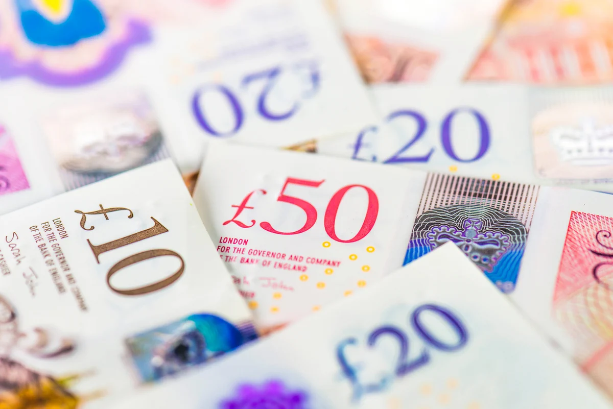 A selection of 10, 20 and 50 pound notes.