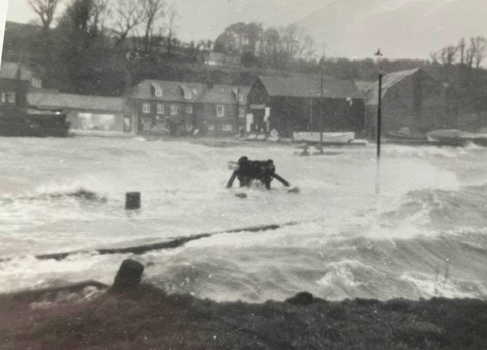 padstowharbour's tweet image. Here’s a great old picture of the inner harbour during a South Easterly gale way before the flood prevention was installed. Note the train buffer on the quay#padstow#harbour#somerough