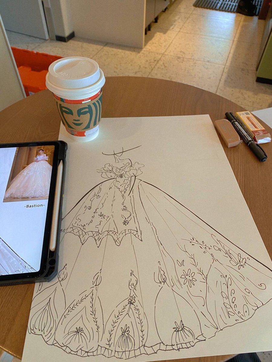 Dimple_Dimple15's tweet image. Embracing creativity with a touch of elegance. This drawing of a dress, accompanied by a warm cup of coffee, inspires the perfect blend of artistry and comfort. ☕✨ #ArtisticInspiration #FashionSketch #CoffeeMoments
