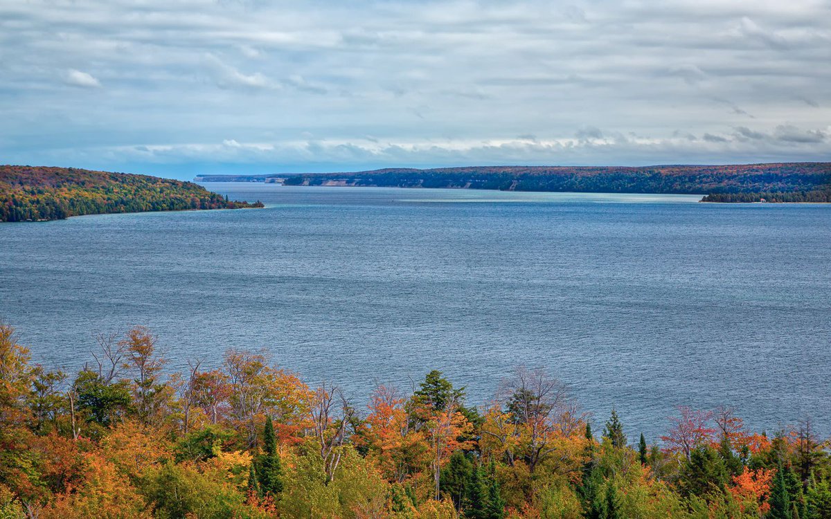 Grand Island Harbor is one of the deepest harbors on the Great Lakes. It is located by Munising, Michigan on Lake Superior. It is also the home of the famous Pictured Rocks. Fall colors are present as the area transitions into winter. #greatlakes #travel #photography