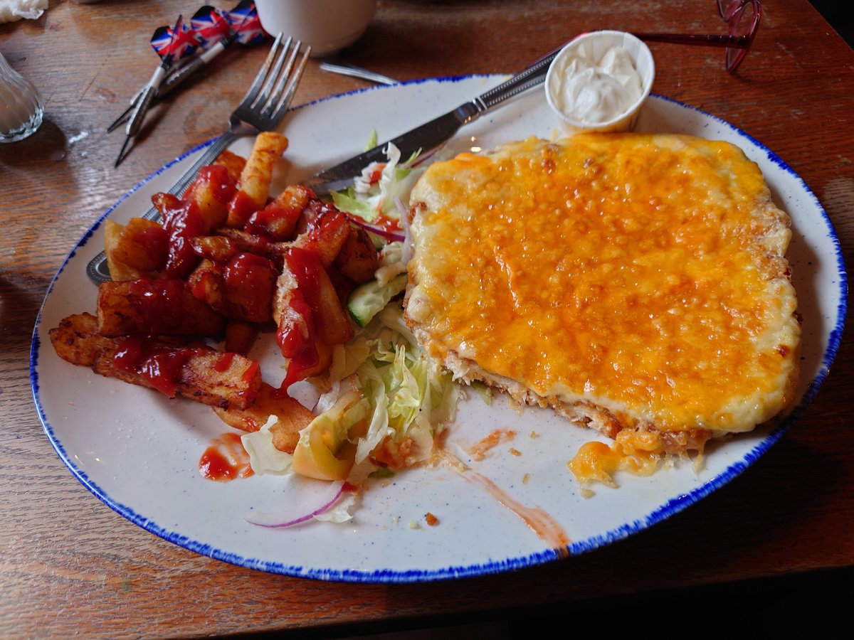 Sat in The Poverina having a Parmo in Normanby and <a href="/duzza/">helen durrant</a> is on the TV. Almost enough to put you off your dinner mate  😂