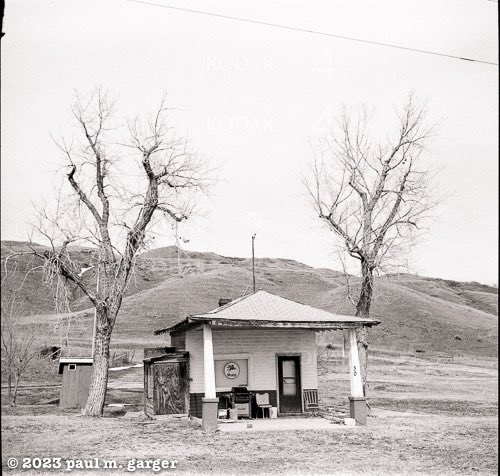 The old gas station is now a residence in South Dakota. Caught on film, Kodak 66 camera, expired tri--x film and caffenol developer.