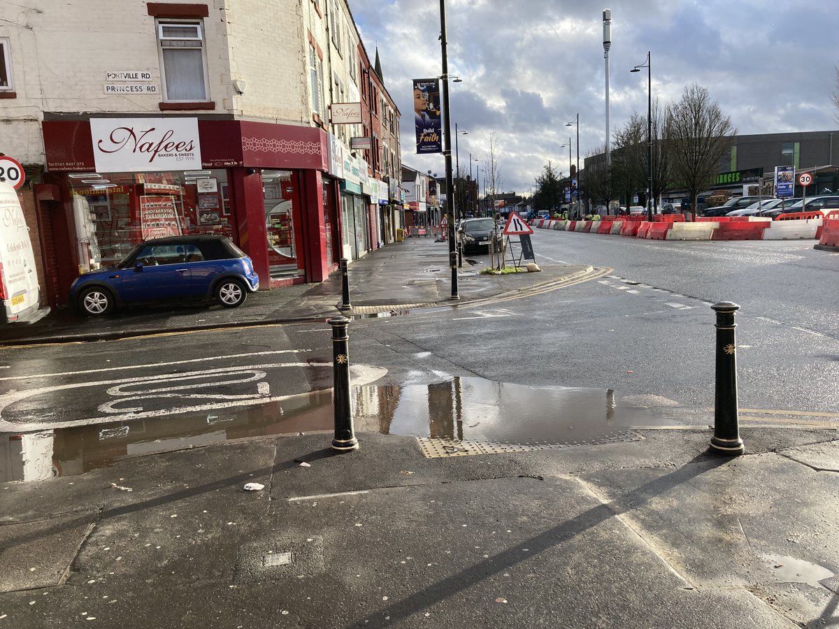 neilinlevy's tweet photo. Hi @bevcraig can @ManCityCouncil  explain why after years of asking for bollards on these corners, just ONE DAY later they're failing to stop cars being driven along the pavement and parked?🤦‍♂️
That new tactile paving will be destroyed in weeks too.
Levenshulme deserves better. https://t.co/tG1902hcjT