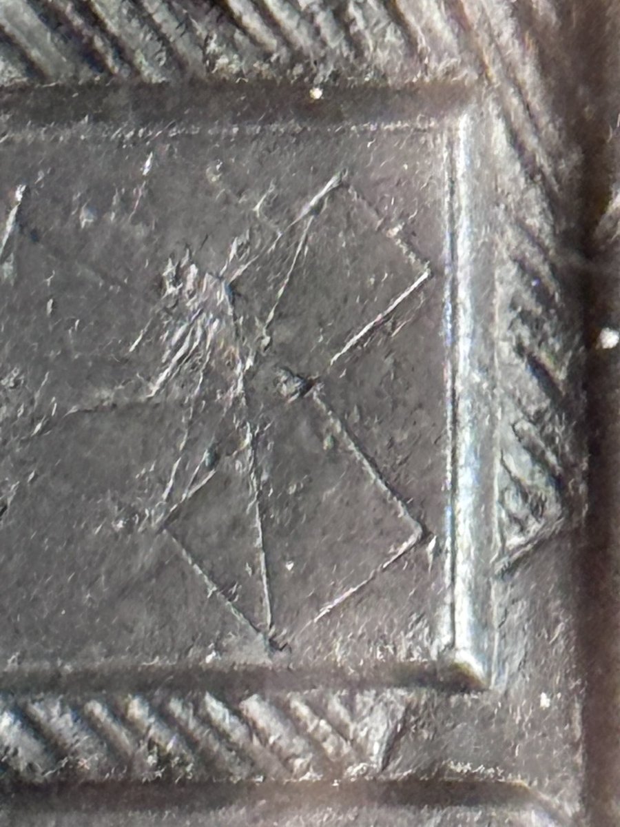 whitegoldsword's tweet photo. In the #Soane collection of #Napoleonic coins at his house at Lincoln’s Inn Fields is a lone #Masonic plaque. The symbolism is as followed-
A pair of compasses and set-square are overlaid in the tradition Masonic arrangement. Beneath is a level which contains the letter G. In #Freemasonry this depicts #Geometry or #God, the ‘Grand Geometrician of the Universe’. In Masonic lodges of the past the letter G was either positioned at the centre of the lodge in either a #BlazingStar or suspended from the lodge ceiling. In the centre is a plumb line with two squares either side. The one of the right could be the Book of Sacred Law on which the Mason swears his oath- this is the #Bible if he is Christian, the #Torah if Jewish, the #Quran if Muslim etc.
The symbol of the left is that of a past Master- Euclid’s 47th Proposition. This symbol appeared on the frontispiece of James Anderson’s ‘Constitutions of the Free-Masons’ of 1723
Behind the symbols is a blaze, all set within a floral surround.
@SoaneMuseum