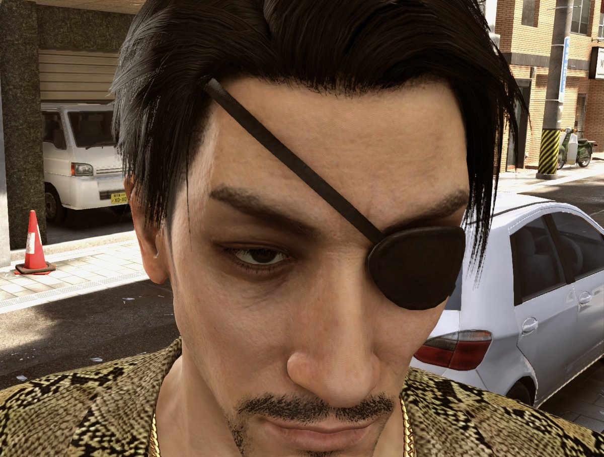 tonijima's tweet photo. people may hate kiwami 2 but at least I can play as majima, stand in front of a wall, flip the camera around and just stare at him like this https://t.co/sRua58dM8E