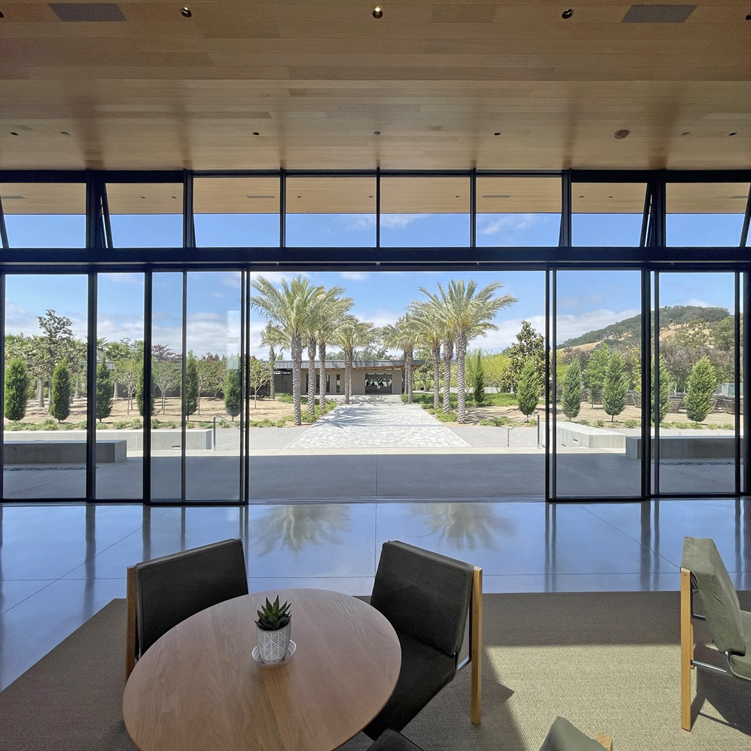 FenestrationInc's tweet photo. The Caymus-Suisun Winery project includes floor-to-ceiling glass, 30-foot-wide sliding doors on each side of the building, and an oversized skylight over the central space. The west tasting room features a 30-foot cantilevering roof, along with automated motorized awning windows. https://t.co/14fWM6cCbY